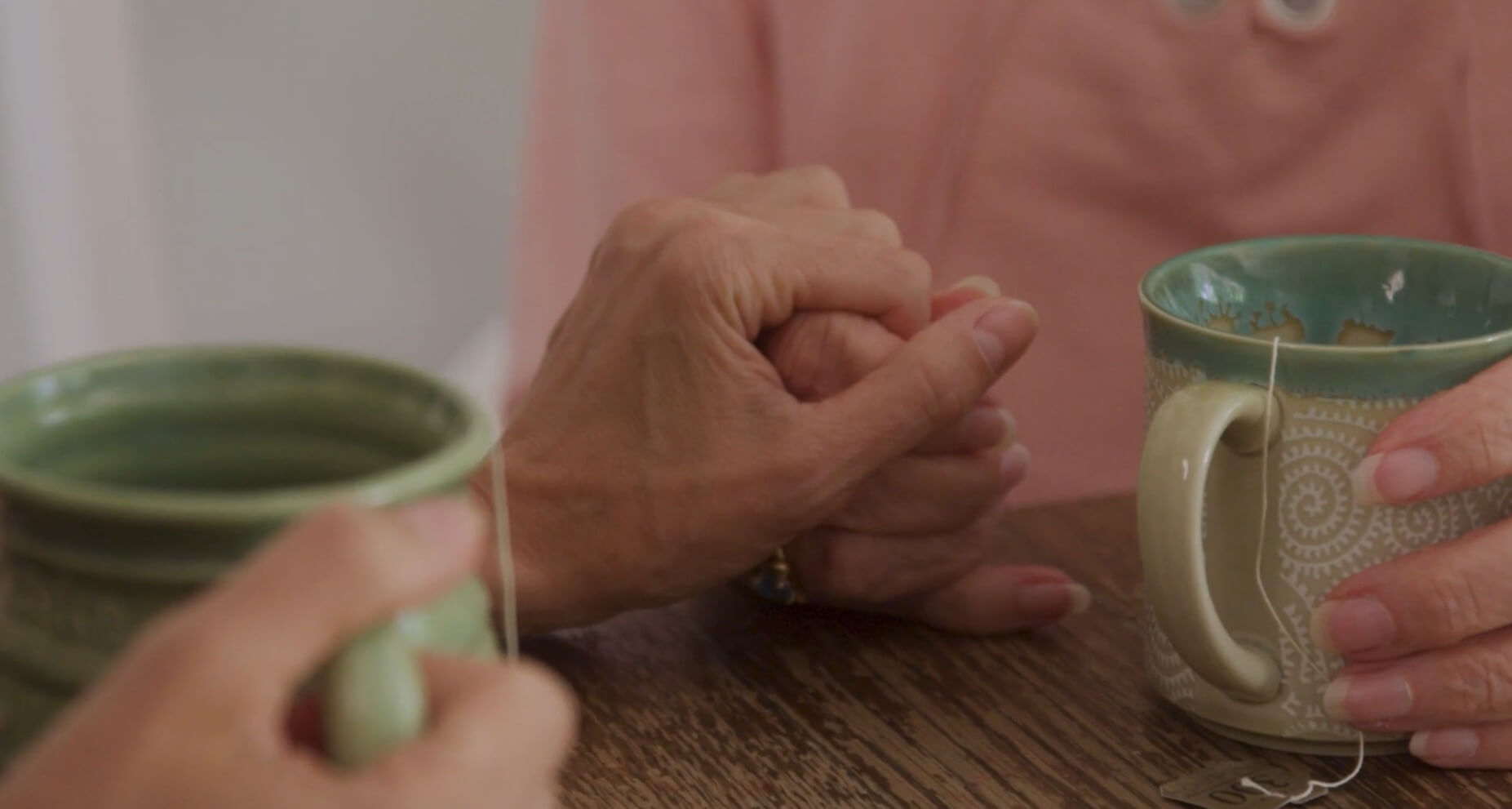 Holding hands in support